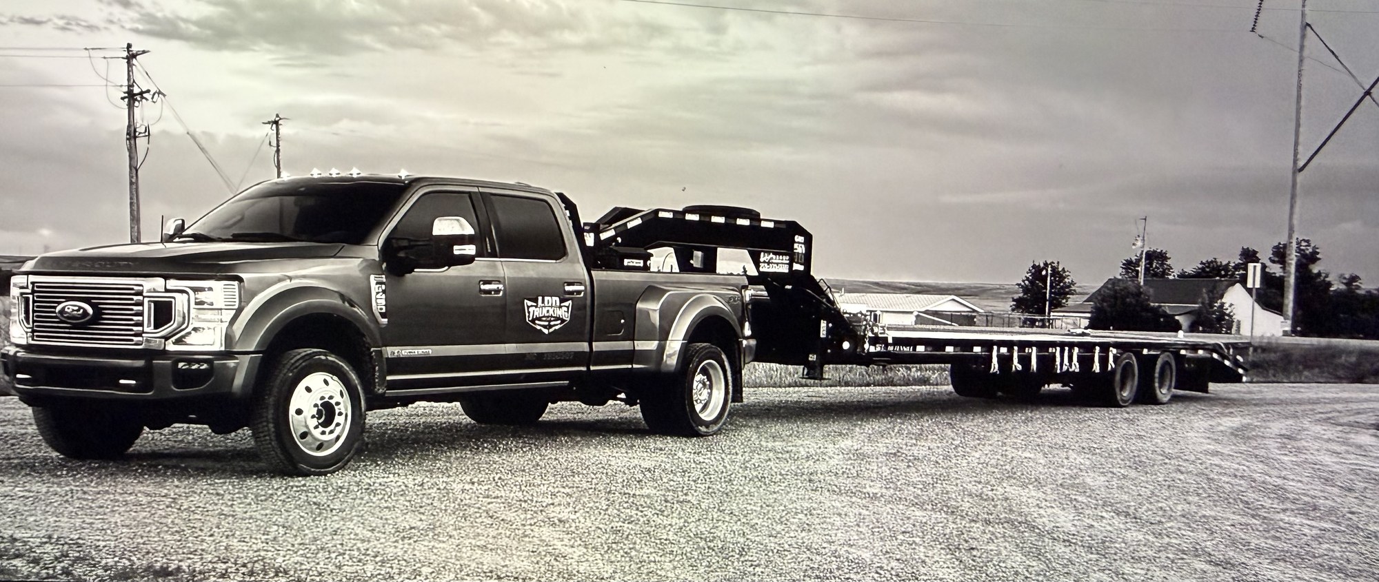 LDD Trucking pickup and flatbed trailer